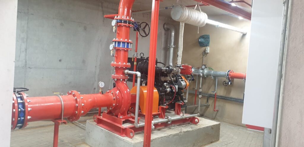 And Beyond Warehouse — service room pipework